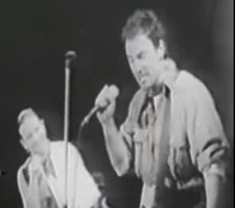Bono and Bruce Springsteen, performing together in 1987.